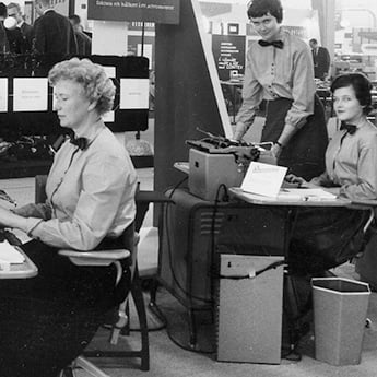 Black and white image of women in Kontek's office in the mid-20th century.