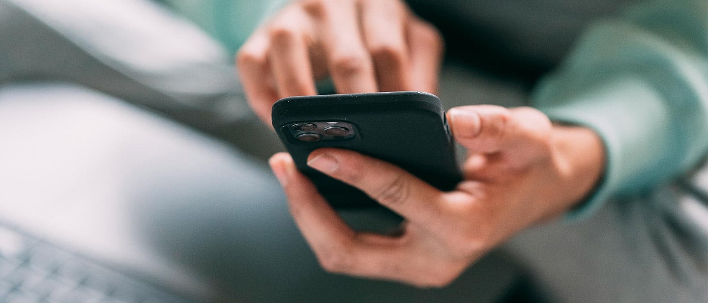 hands holding a mobile phone 